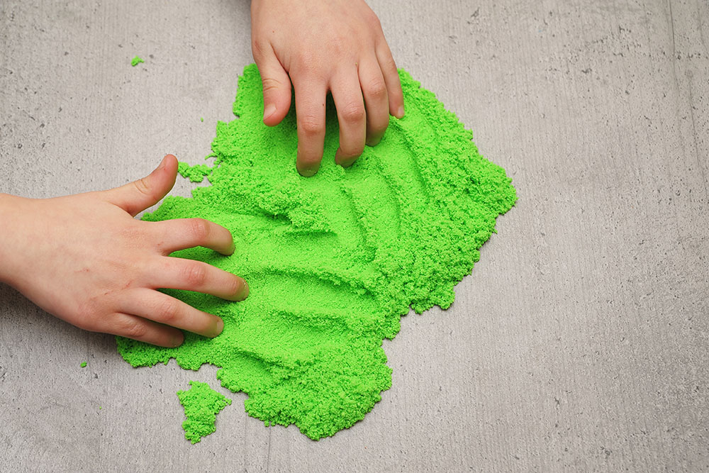 Gekleurd speelzand bevat mogelijk asbest